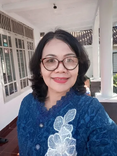 Dra. Rr. Yuli Suryani, M.Si.